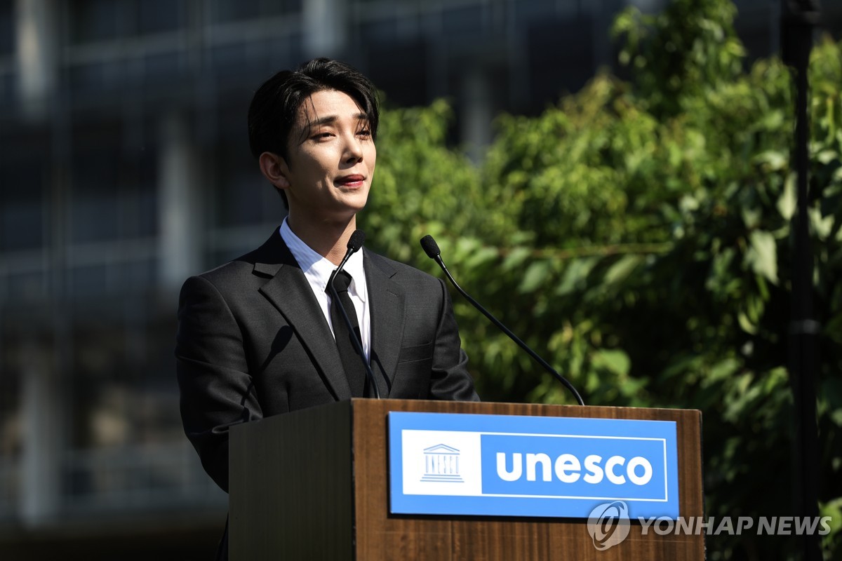 Joshua, a member of Seventeen gives a speech during the ceremony for the appointment of the South Korean boy group as UNESCO's Goodwill Ambassador for Youth at the UNESCO headquarters in Paris on June 26, 2024, in this EPA photo. (Yonhap)