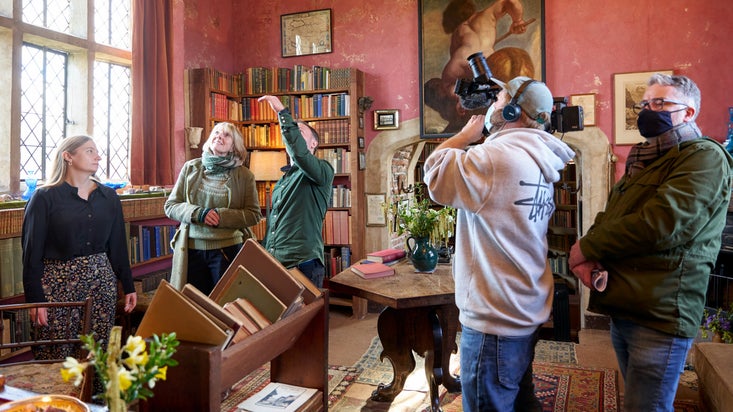 A production team behind the scenes filming at Sissinghurst, Kent