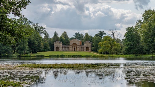 A view of the Temple of Venus at Stowe in Buckinghamshire across the lake