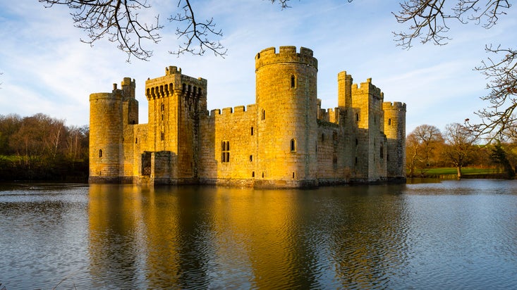 The castle surrounded by the moat in winter, Bodiam Castle, East Sussex