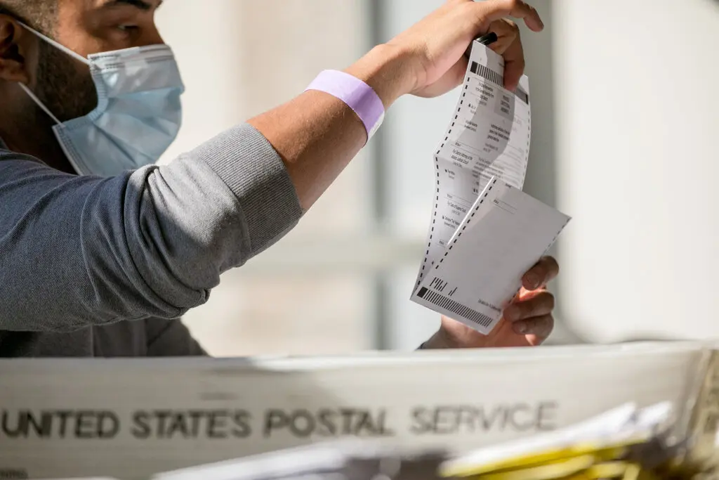 A worker counting ballots in Georgia, which Joseph R. Biden Jr. led with about 12,000 votes.