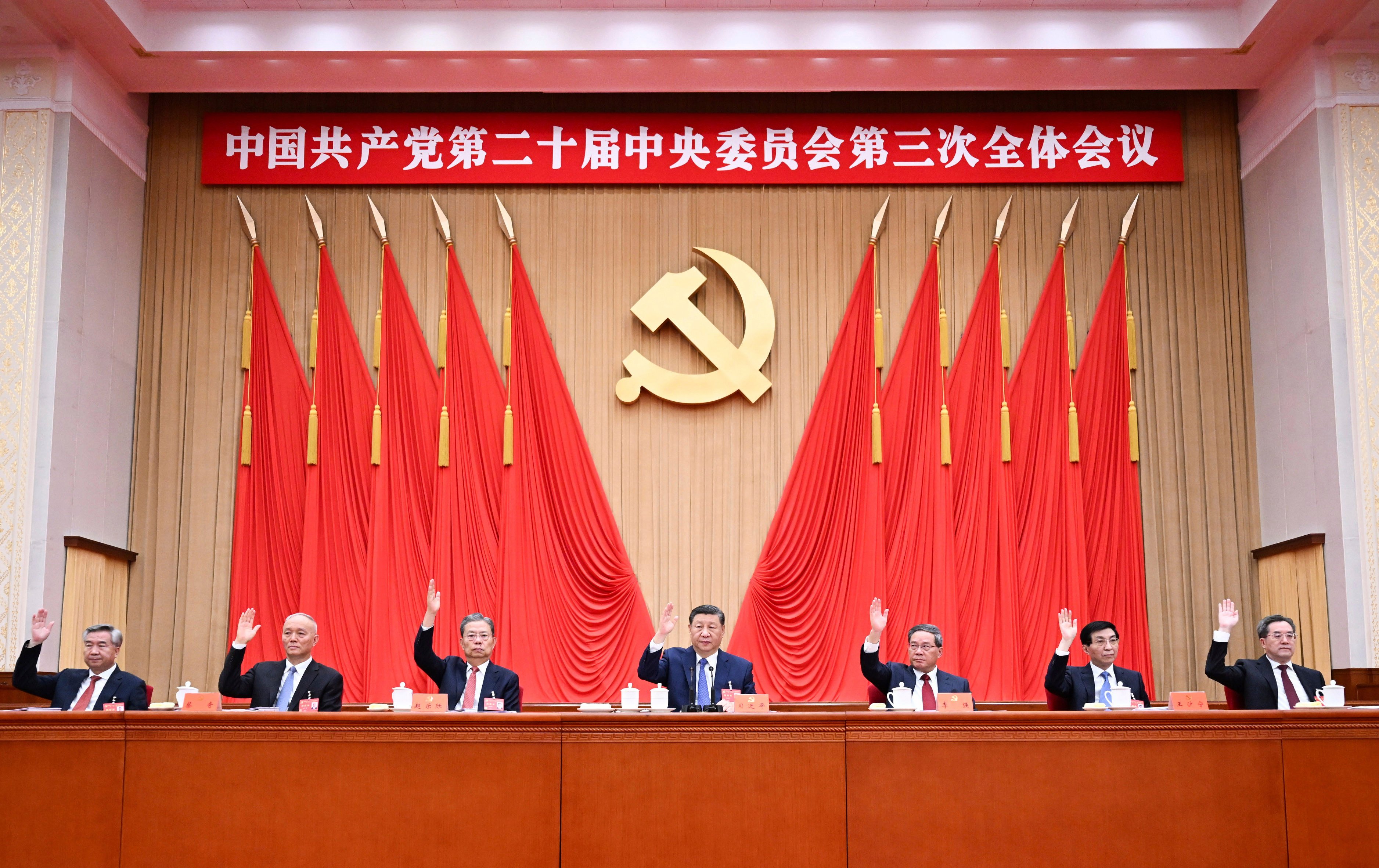 Top leaders attend the third plenary session of the 20th Communist Party of China Central Committee in Beijing. Photo: AP