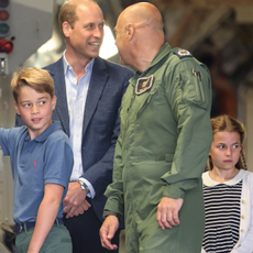Prince William, Prince of Wales with Prince George of Wales and Princess Charlotte of Wales during their visit to the Air Tattoo at RAF Fairford on July 14, 2023 in Fairford, England. 
