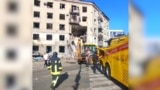 Russian Strike On Kharkiv Apartment Building Leaves Dead, Injured