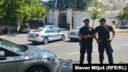 Serbian police stand outside the Israeli Embassy in Belgrade after an attack on an embassy guard on June 29. 