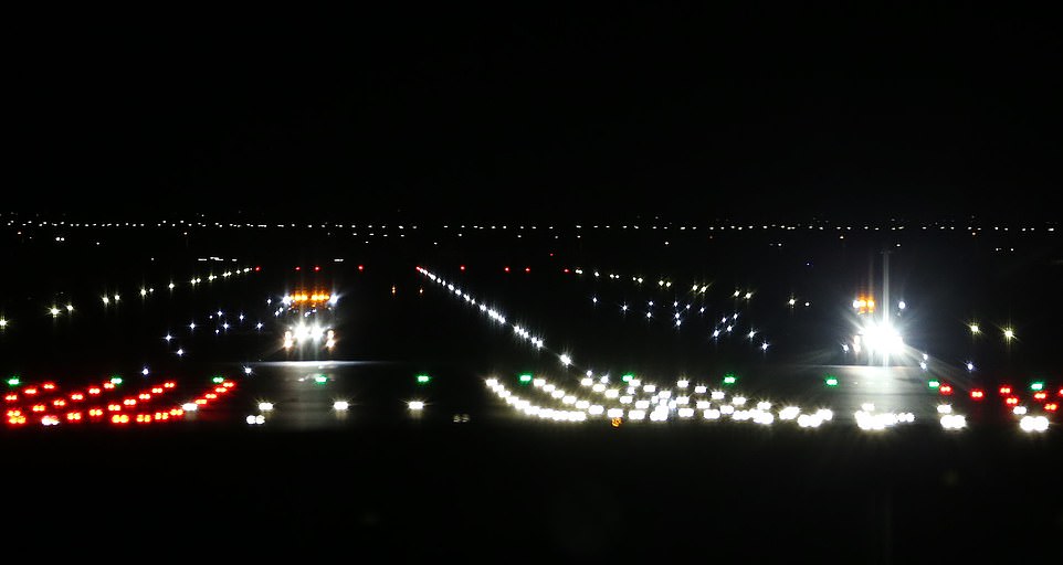 Flights were grounded as a drone was spotted flying at Gatwick (pictured), shutting down the runway from 9pm last night until 3am on Thursday morning. It was only open for 45 minutes before airport officials reinstated the departure ban again at 3.45am (pictured)