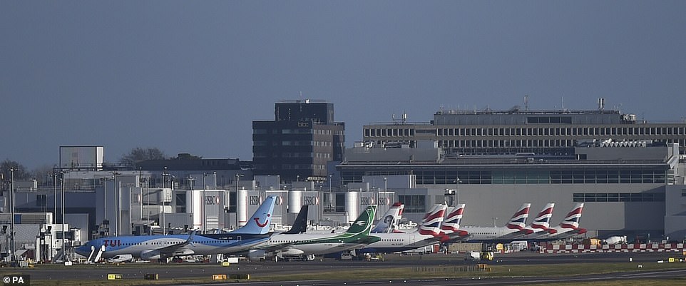 All of the hundreds of planes currently at Gatwick are grounded (pictured today) with hundreds more diverted to other UK and European airports