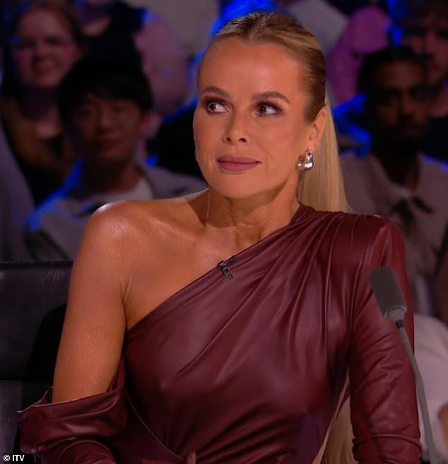 During Monday's first live semi-final, Amanda caught the eyes of Britain's Got Talent viewers as she wore a revealing claret red dress