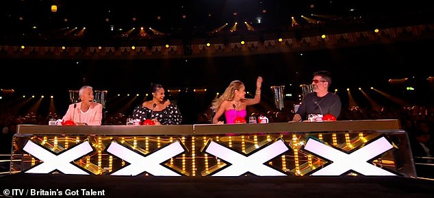 Amanda was seen reacting to Simon after he attempted to claim the Golden Buzzer act as his own during Wednesday's semi-final