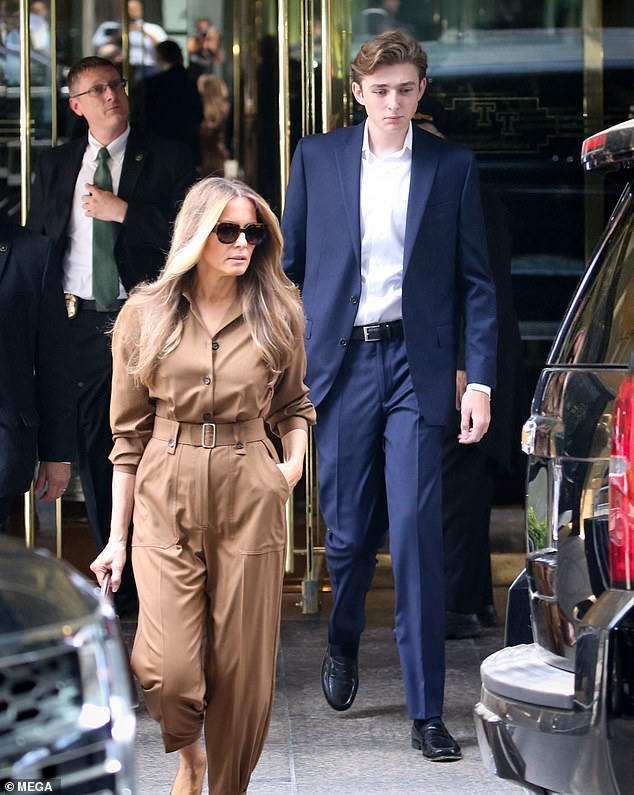 Former First Lady Melania Trump, 545, steps out of Trump Tower in Manhattan on Tuesday with son Barron, 18, in tow after entering 12 days earlier and not being seen since