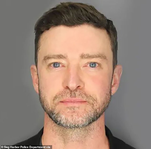 Britney's fans recently thought the took a jab at her ex Justin Timberlake with an Instagram post in which she drank a fruity cocktail while toasting to the little things; pictured in his mug shot