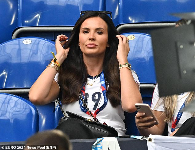 Ellie Alderson, the girlfriend of Ollie Watkins, took her seat ahead of the 5pm GMT kick off of the crucial match