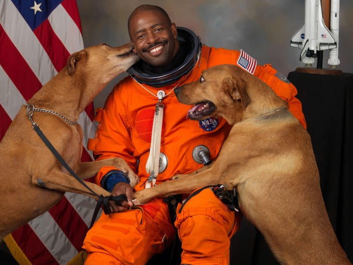 leland melvin astronaut dogs kissing nasa