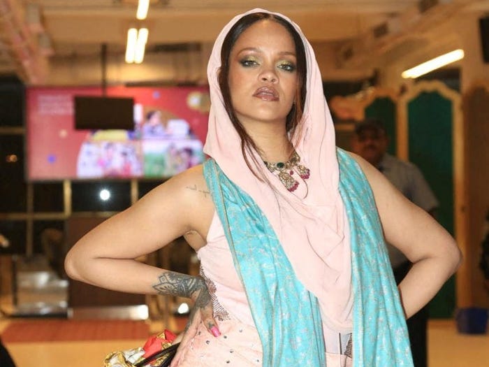 Rihanna poses for a picture at the pre-wedding celebrations of Anant Ambani, son of Mukesh Ambani, the Chairman of Reliance Industries, and Radhika Merchant, daughter of industrialist Viren Merchant, at the airport in Jamnagar, Gujarat, India, March 2, 2024.