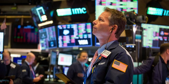 Traders work at the New York Stock Exchange in New York, the United States, March 16, 2020