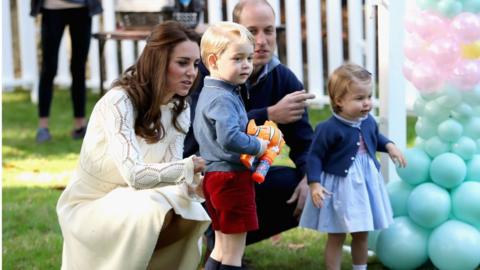 Catherine, Duchess of Cambridge, Princess Charlotte of Cambridge and Prince George of Cambridge, Prince William, Duke of Cambridge at a childrens party