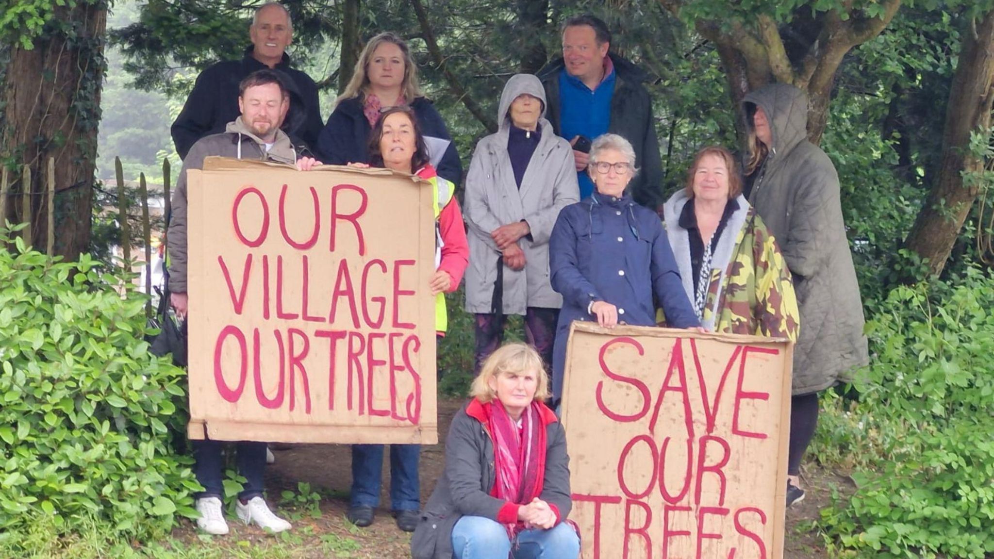 Wadhurst residents nestled among the trees with placards