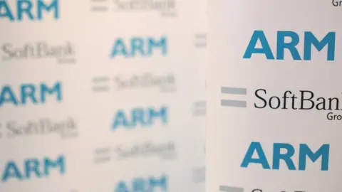 Reuters An Arm and SoftBank Group branded board is displayed at a news conference in 2016