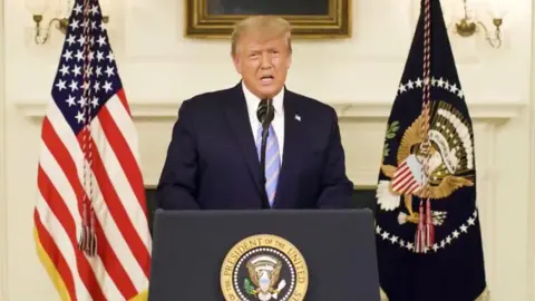 Reuters A still image taken from video provided on social media on January 8, 2021. Donald Trump via Twitter. US President Donald Trump gives an address, a day after his supporters stormed the US Capitol in Washington,