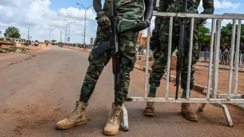 Getty Images Soldiers from Niger holding guns