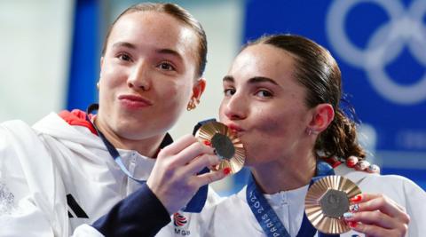 Great Britain's Yasmin Harper and Scarlett Mew Jensen pose with their medals after winning bronze at the Paris 2024 Olympics