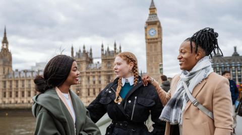 Young people near the Palace of Westminster