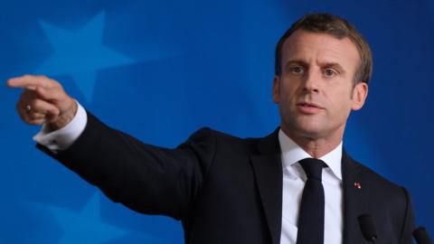 Emmanuel Macron pointing