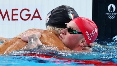 Adam Peaty in the water after the Olympic final