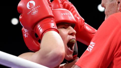 Rosie Eccles reacts during the Olympic boxing