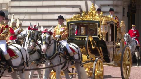 Charles and Camilla in carriage