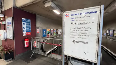 'No down escalator' sign inside Kentish Town station