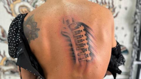 The unfinished tattoo on Ms Ellis' back
