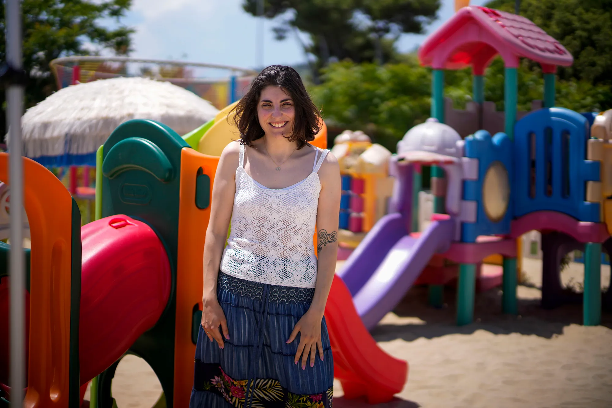 Federica Nobil standing in front of a playground
