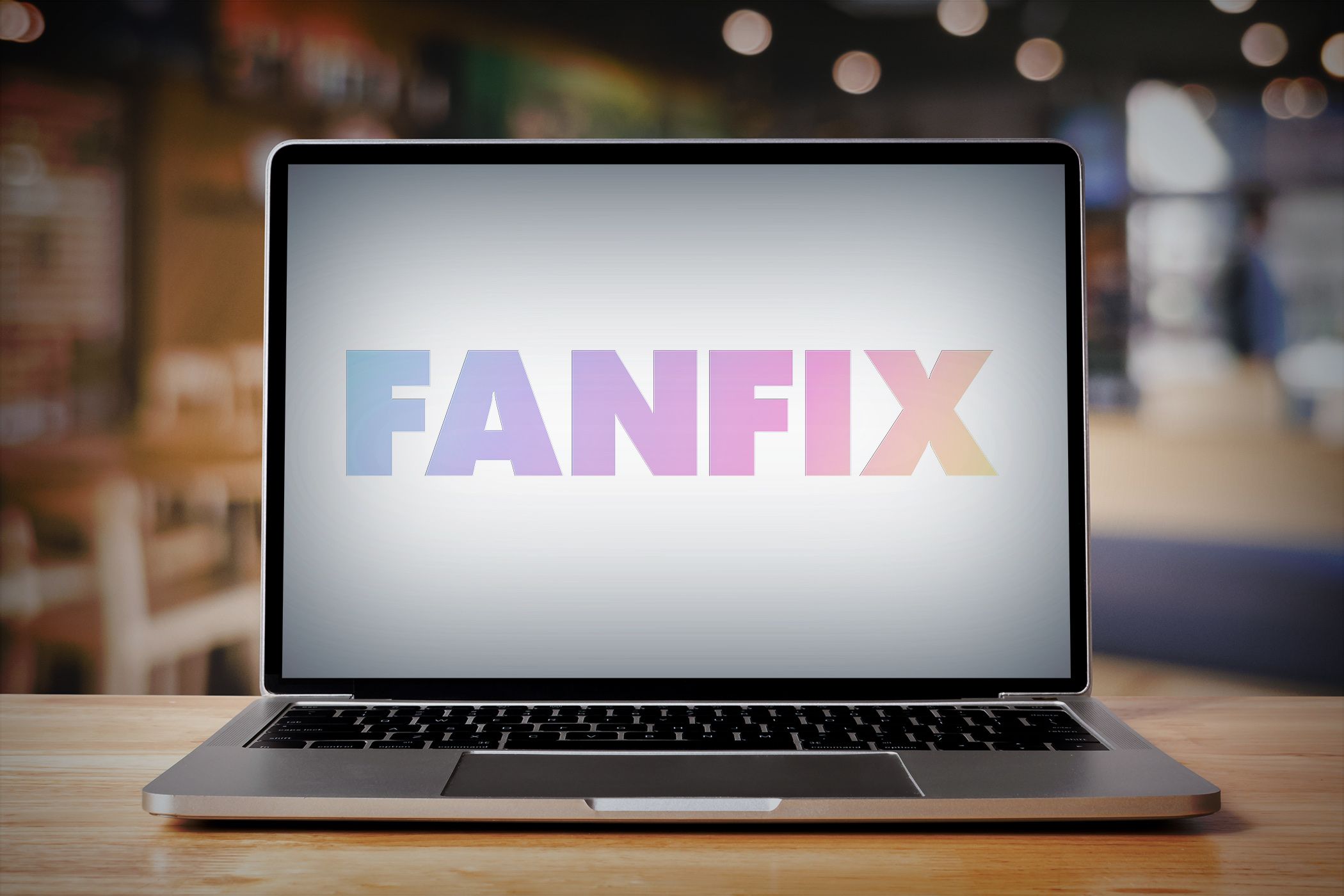 a laptop with the fanfix logo 