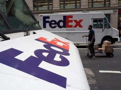 Amazon posing a threat to FedEx is a 'fantastical' idea, FedEx CEO said - but the reality is much more complicated