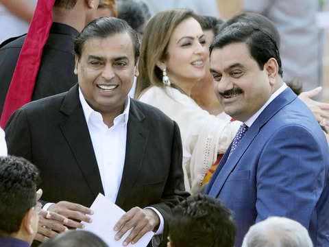 Gautam Adani and Mukesh Ambani - dominate the India rich list with the gap between them the rest of India Inc being a very large one