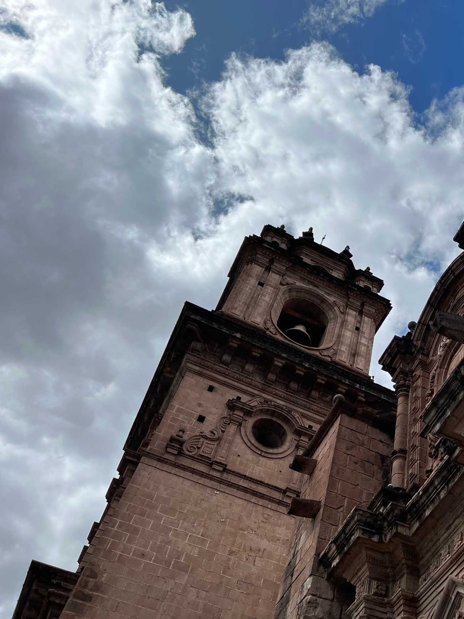 Part of the facade of the Iglesia de la Compañía de Jesús (Church of the Society of Jesus) in Cusco's Plaza de Armas, the city center. Built atop an Inca palace, it is one of the best examples of Spanish Baroque architecture in Peru and its design greatly influenced the development of Baroque architecture in the South Andes. Begun in 1576, the church was badly damaged in an earthquake in 1650; its rebuilding was completed in 1673.