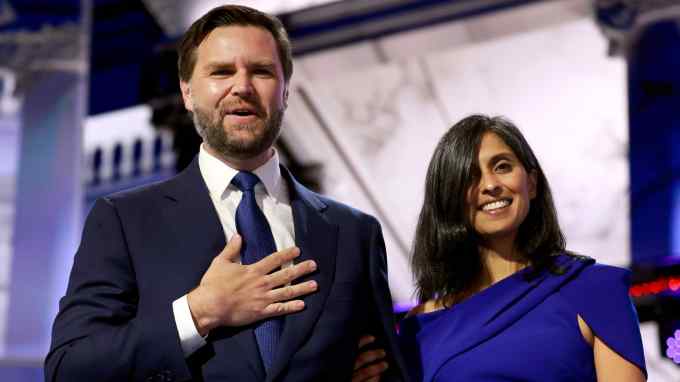 JD Vance and his wife Usha on stage at the convention