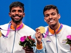 Chirag Shetty and Satwiksairaj Rankireddy pose for photos during the presentation ceremony after winning the men's doubles gold (PTI)
