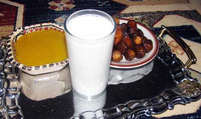palm dates, bsisa and a glass of milk