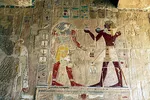 Pharaoh Hatshepsut making an offering to Horus.