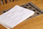 Family tree and Diagram laying on a table