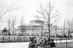 Immigrants sit on benches at the Castle Garden immigration station in New York City.