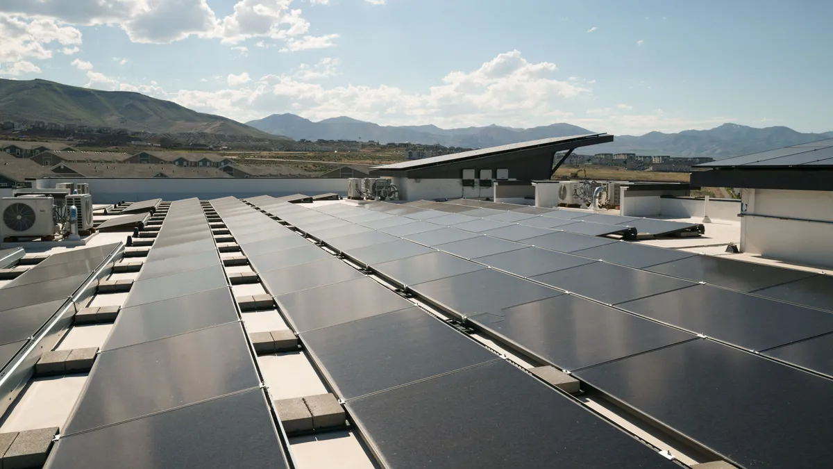 Rooftop solar panels at the Soleil Lofts apartment complex in Herriman, Utah
